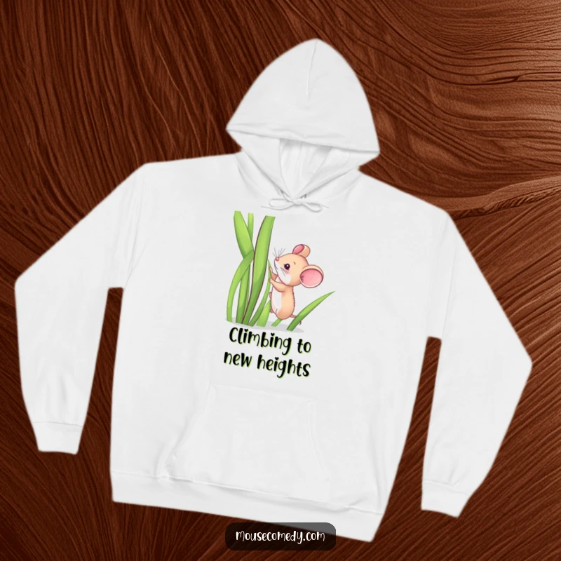 Funny hoodie showing a small mouse bravely ascending a giant green blade of grass, a humorous depiction of effort.