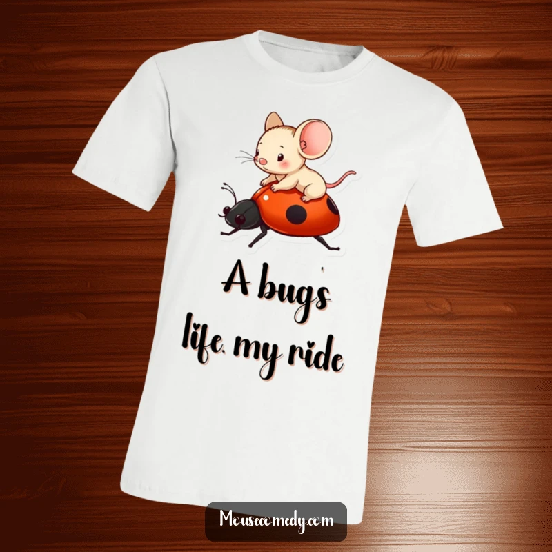 Funny tiny mouse happily perched atop a ladybug, soaring through the air on a soft t-shirt.
