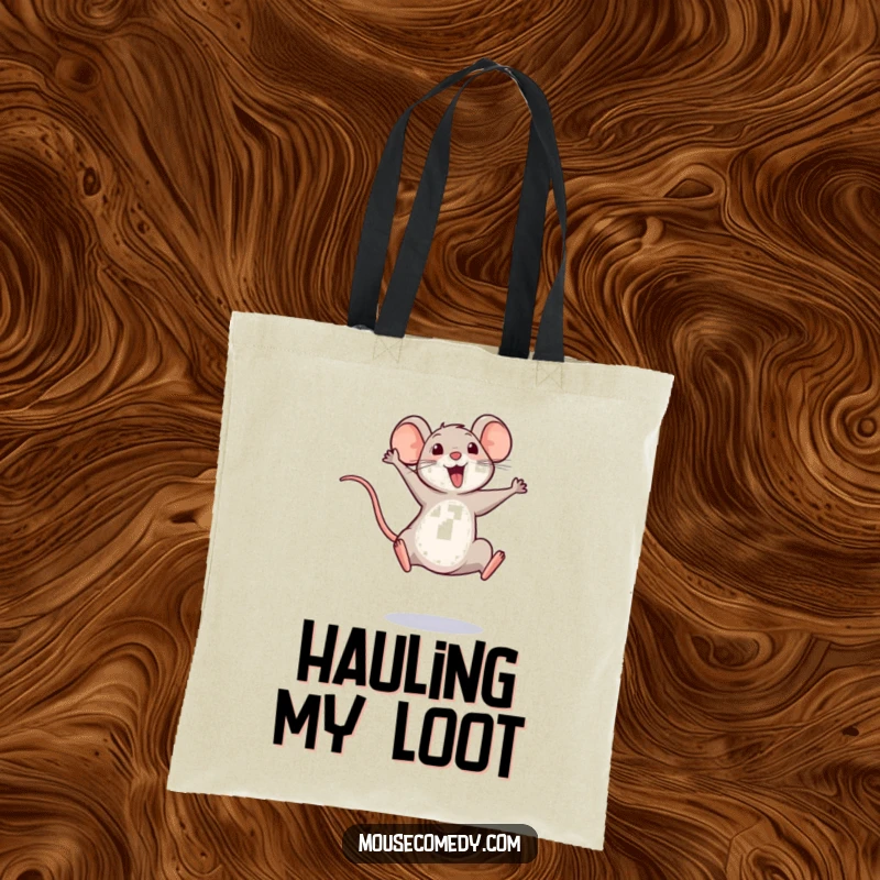 Funny tote bag printed with a small mouse in a high, triumphant leap, its tail signifying pure joy and success.